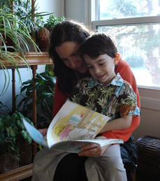 Precious Moments—Reading to children not only develops language skills, it strengthens the bond between parents and children.